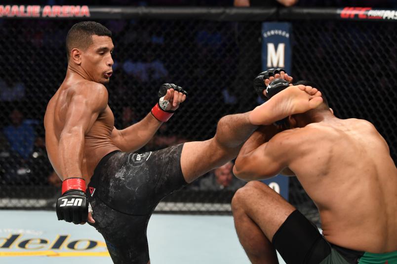 TAMPA, FLORIDA - OCTOBER 12: (L-R) Miguel Baeza kicks Hector Aldana of Mexico in their welterweight bout during the UFC Fight Night event at Amalie Arena on October 12, 2019 in Tampa, Florida. (Photo by Josh Hedges/Zuffa LLC via Getty Images)