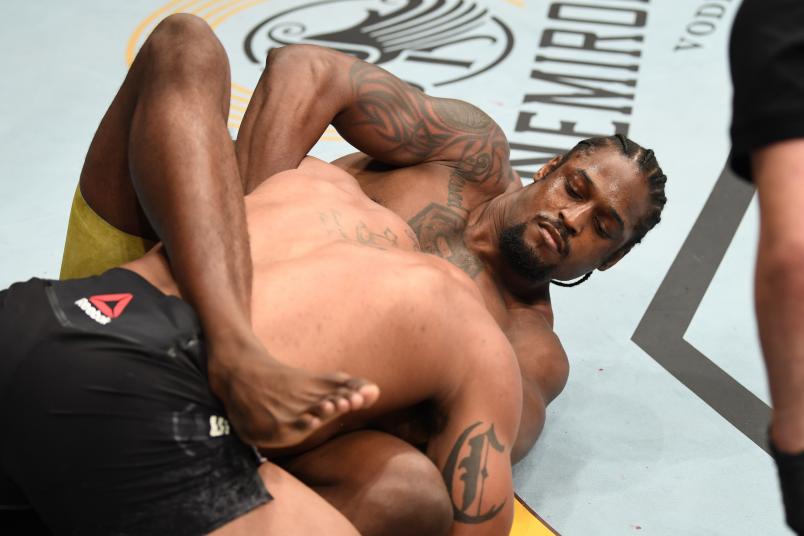 TAMPA, FLORIDA - OCTOBER 12: (R-L) Ryan Spann attempts to submit Devin Clark in their light heavyweight bout during the UFC Fight Night event at Amalie Arena on October 12, 2019 in Tampa, Florida. (Photo by Josh Hedges/Zuffa LLC)