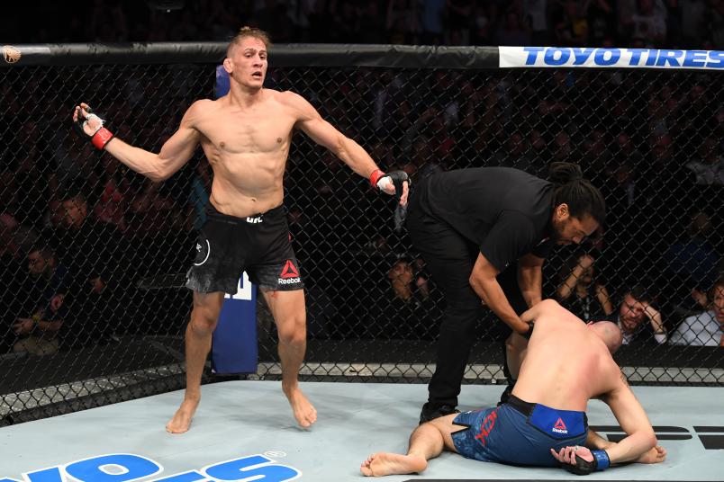 TAMPA, FLORIDA - OCTOBER 12: (L-R) Niko Price celebrates his KO victory over James Vick in their welterweight bout during the UFC Fight Night event at Amalie Arena on October 12, 2019 in Tampa, Florida. (Photo by Josh Hedges/Zuffa LLC)