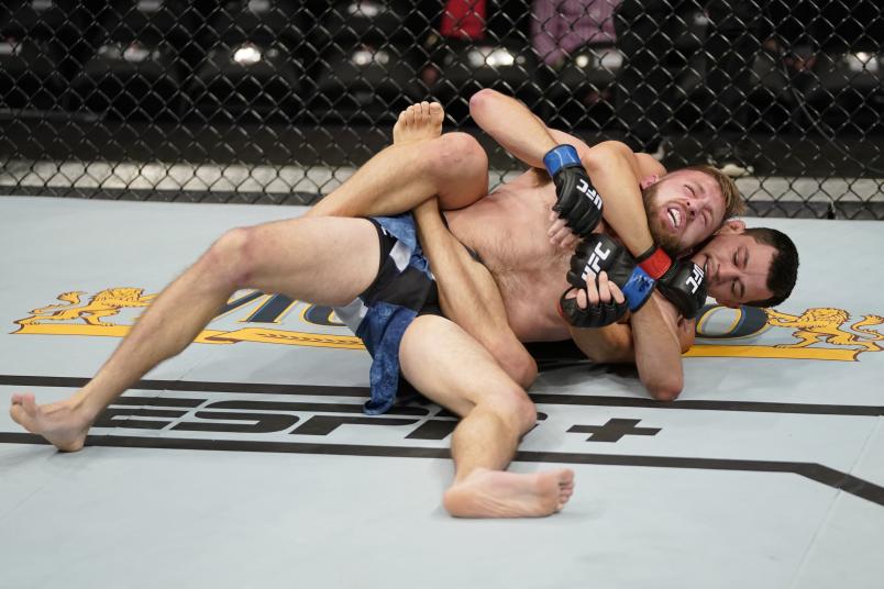 WASHINGTON, DC - DECEMBER 07: (R-L) Billy Quarantillo attempts to submit Jacob Kilburn in their featherweight bout during the UFC Fight Night event at Capital One Arena on December 07, 2019 in Washington, DC. (Photo by Jeff Bottari/Zuffa LLC via Getty Images)
