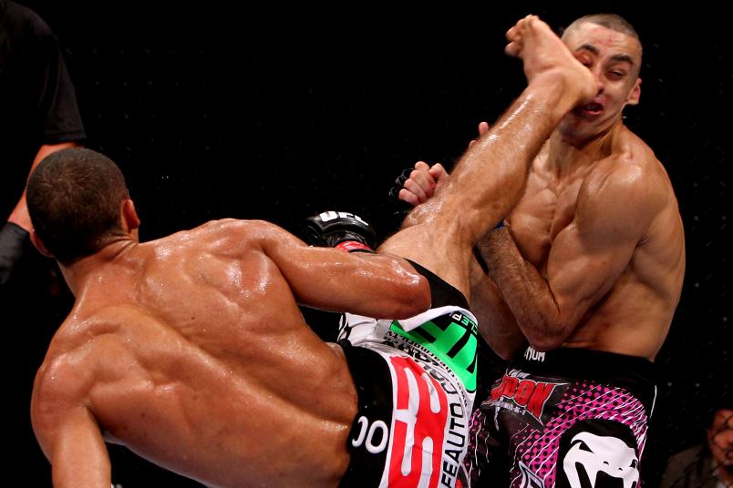 RIO DE JANEIRO, BRAZIL - JANUARY 14: Edson Barboza (L) knocks out Terry Etim (R) with a spinning back kick in a lightweight bout during UFC 142 at HSBC Arena on January 14, 2012 in Rio de Janeiro, Brazil. (Photo by Josh Hedges/Zuffa LLC/Zuffa LLC via Getty Images)