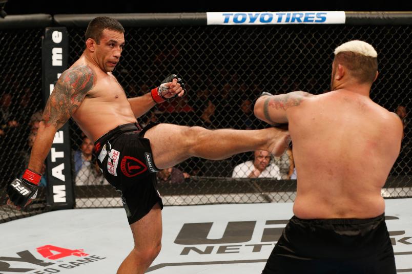 Fabricio Werdum kicks Mark Hunt in their interim UFC heavyweight championship bout during the UFC 180 event at Arena Ciudad de Mexico on November 15, 2014 in Mexico City, Mexico. (Photo by Josh Hedges/Zuffa LLC via Getty Images)