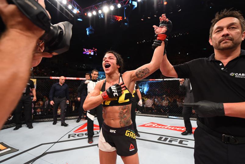 RIO DE JANEIRO, BRAZIL - AUGUST 01: Claudia Gadelha of Brazil celebrates her victory over Jessica Aguilar of the United States in their women's strawweight bout during the UFC 190 event inside HSBC Arena on August 1, 2015 in Rio de Janeiro, Brazil. (Photo by Josh Hedges/Zuffa LLC/Zuffa LLC via Getty Images)