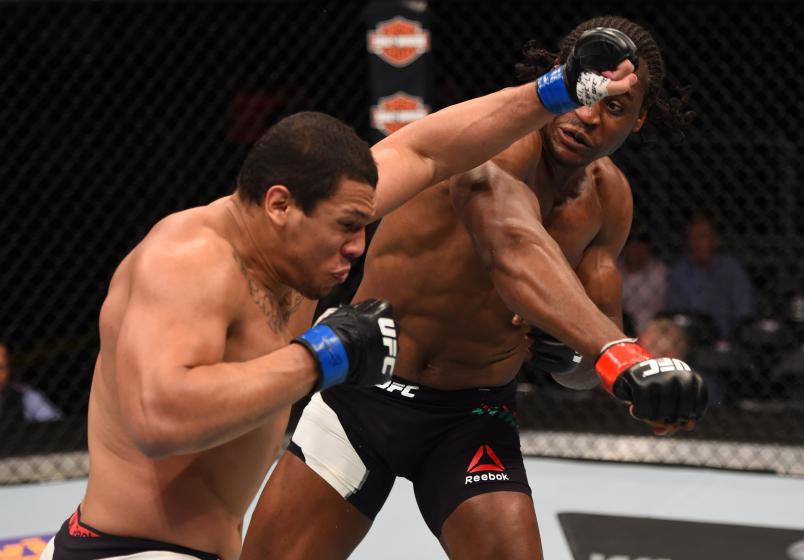 ORLANDO, FL - DECEMBER 19: (R-L) Francis Ngannou punches Luis Henrique in their heavyweight bout during the UFC Fight Night event at the Amway Center on December 19, 2015 in Orlando, Florida. (Photo by Josh Hedges/Zuffa LLC/Zuffa LLC via Getty Images)