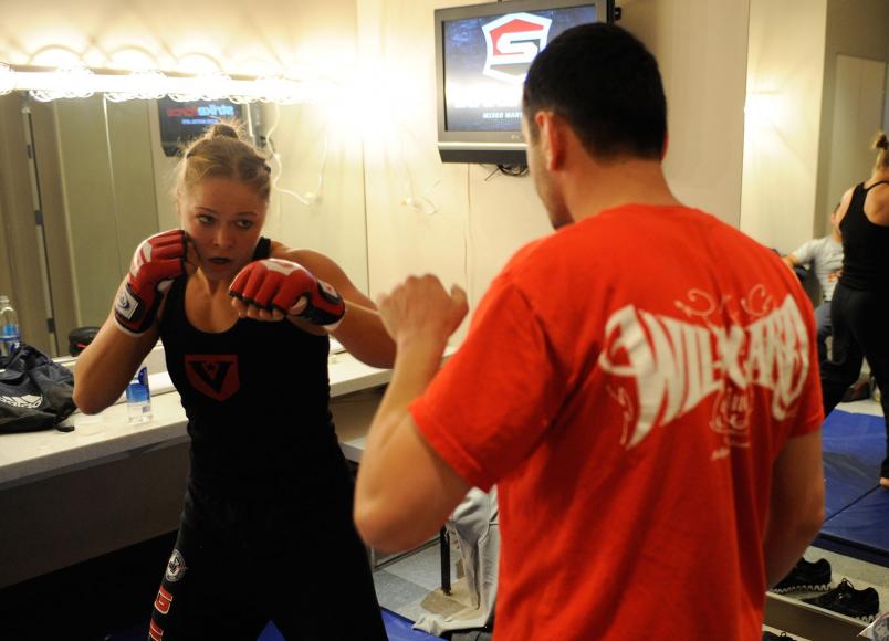 Ronda Rousey warms up before her fight with Julia Budd backstage at the Pearl at the Palms on November 18, 2011 in Las Vegas, Nevada. (Photo by Todd Lussier/Forza LLC)