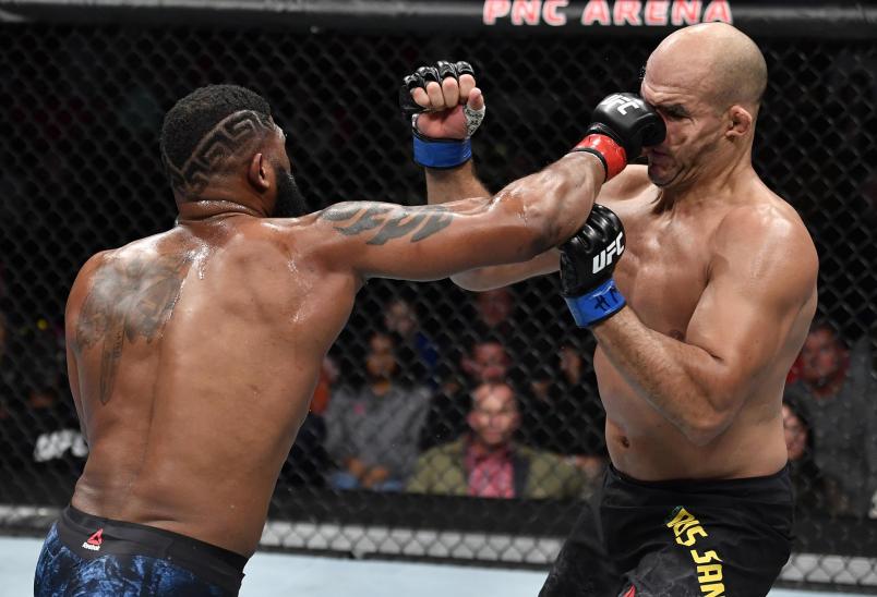 Blaydes punches Junior Dos Santos in Raleigh (Photo by Jeff Bottari/Zuffa LLC)