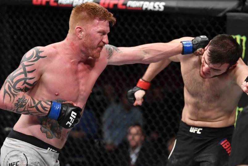 MOSCOW, RUSSIA - NOVEMBER 09: (L-R) Ed Herman punches Khadis Ibragimov of Russia in their light heavyweight bout during the UFC Fight Night event at CSKA Arena on November 09, 2019 in Moscow, Russia. (Photo by Jeff Bottari/Zuffa LLC via Getty Images)