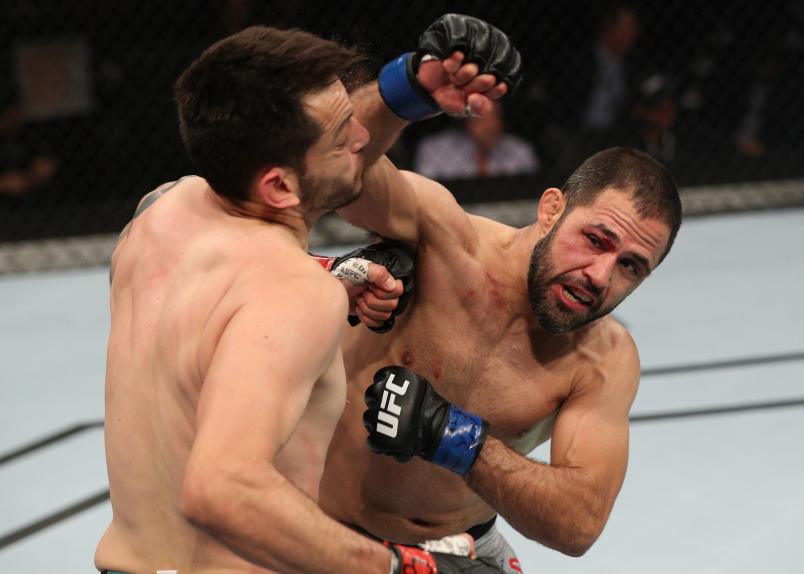 SANTIAGO, CHILE - MAY 19: (R-L) Frankie Saenz punches Henry Briones of Mexico in their bantamweight bout during the UFC Fight Night event at Movistar Arena on May 19, 2018 in Santiago, Chile. (Photo by Buda Mendes/Zuffa LLC/Zuffa LLC via Getty Images)