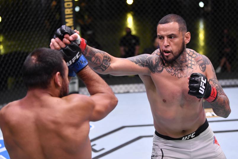 LAS VEGAS, NEVADA - MAY 30: (R-L) Daniel Rodriguez punches Gabe Green in their welterweight fight during the UFC Fight Night event at UFC APEX on May 30, 2020 in Las Vegas, Nevada. (Photo by Jeff Bottari/Zuffa LLC)