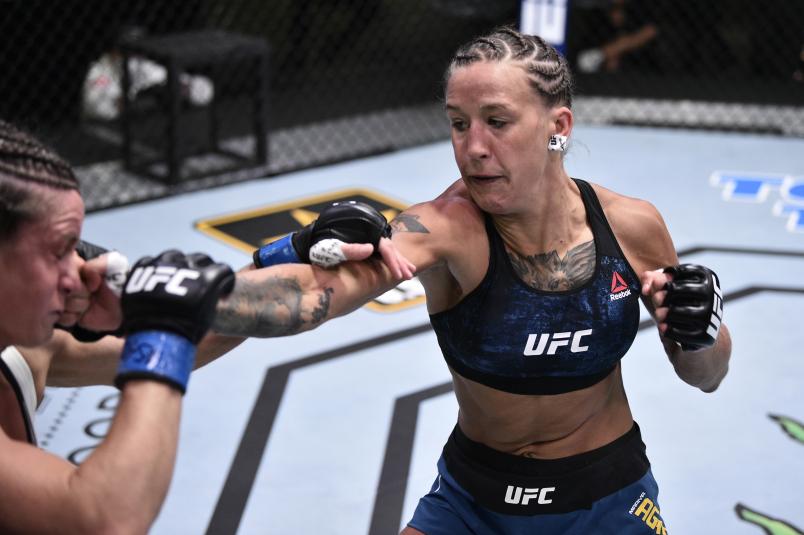 LAS VEGAS, NEVADA - JUNE 13: (R-L) Mariya Agapova of Kazakhstan punches Hannah Cifers in their flyweight fight during the UFC Fight Night event at UFC APEX on June 13, 2020 in Las Vegas, Nevada. (Photo by Chris Unger/Zuffa LLC)