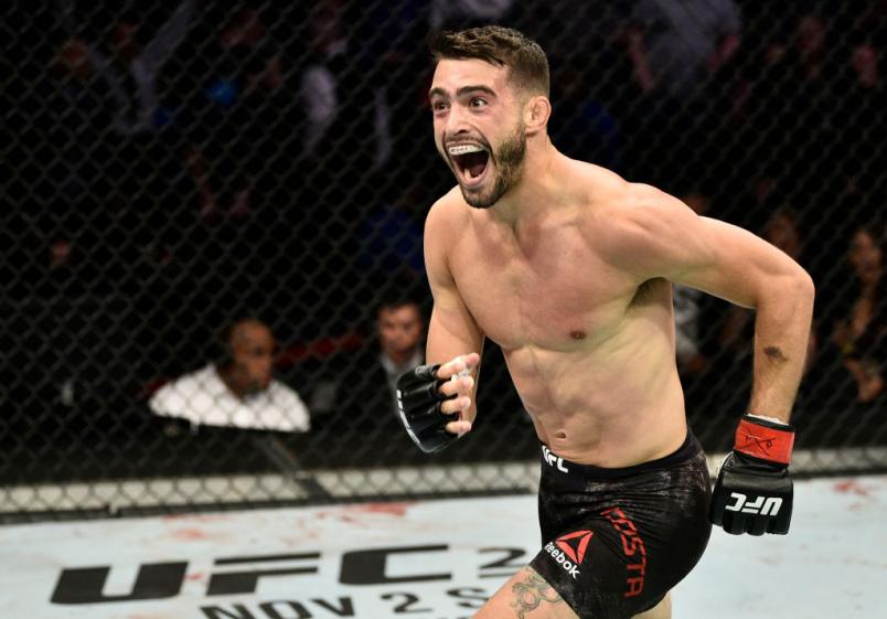 BOSTON, MASSACHUSETTS - OCTOBER 18: Randy Costa celebrates after his knockout victory over Boston Salmon in their bantamweight bout during the UFC Fight Night event at TD Garden on October 18, 2019 in Boston, Massachusetts. (Photo by Chris Unger/Zuffa LLC)