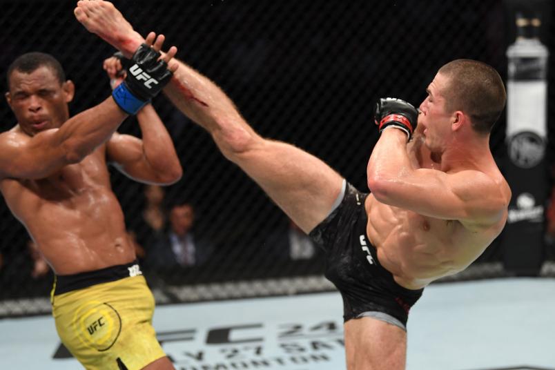 Alexander Hernandez kicks Francisco Trinaldo of Brazil in their lightweight bout during the UFC Fight Night event at AT&T Center on July 20, 2019 in San Antonio, Texas. (Photo by Josh Hedges/Zuffa LLC)