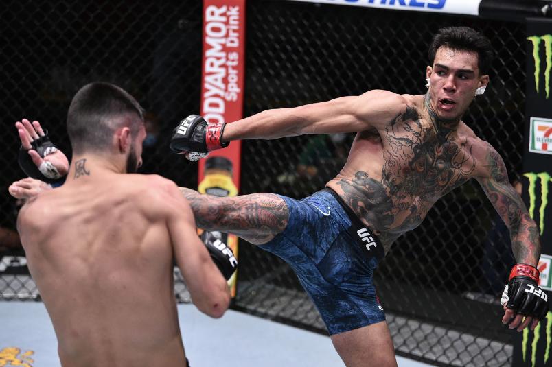 Andre Fili kicks Charles Jourdain of Canada in their featherweight fight during the UFC Fight Night event at UFC APEX on June 13, 2020 in Las Vegas, Nevada. (Photo by Chris Unger/Zuffa LLC)