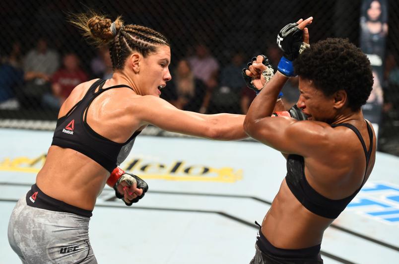 Cortney Casey punches Angela Hill in their womens strawweight fight during the UFC Fight Night event at Pinnacle Bank Arena on August 25, 2018 in Lincoln, Nebraska. (Photo by Josh Hedges/Zuffa LLC)