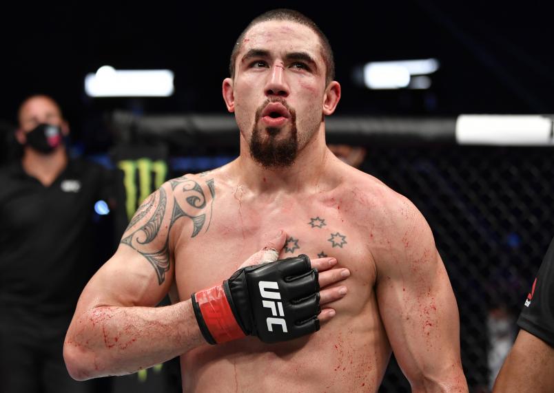 Robert Whittaker of New Zealand reacts after the conclusion of his middleweight fight against Darren Till of England during the UFC Fight Night event inside Flash Forum on UFC Fight Island on July 26, 2020 in Yas Island, Abu Dhabi, United Arab Emirates. (Photo by Jeff Bottari/Zuffa LLC via Getty Images)