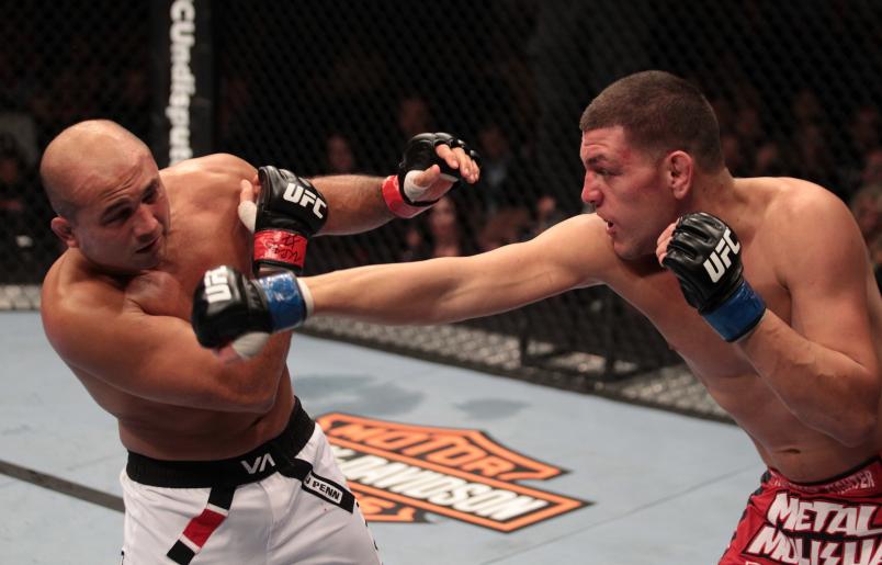 LAS VEGAS, NV - OCTOBER 29: (R-L) Nick Diaz punches BJ Penn during the UFC 137 event at the Mandalay Bay Events Center on October 29, 2011 in Las Vegas, Nevada. (Photo by Jed Jacobsohn/Zuffa LLC/Zuffa LLC via Getty Images)