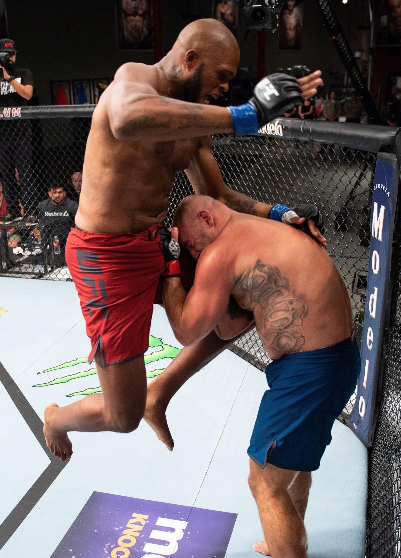 Maurice Greene knees Przemyslaw Mysiala of England during the filming of The Ultimate Fighter: Heavy Hitters on JULY 19, 2018 in Las Vegas, Nevada. (Photo by Chris Unger/Zuffa LLC)