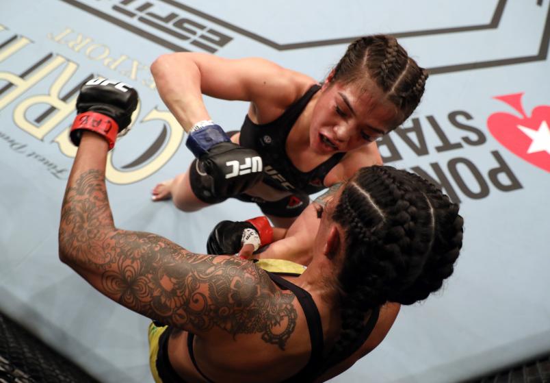 Tracy Cortez punches Vanessa Melo of Brazil in their bantamweight fight during the UFC Fight Night event at Ibirapuera Gymnasium on November 16, 2019 in Sao Paulo, Brazil. (Photo by Alexandre Schneider/Zuffa LLC via Getty Images)