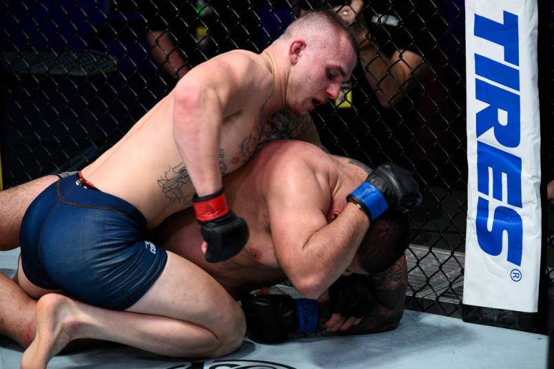 LAS VEGAS, NEVADA - NOVEMBER 17: (L-R) Nick Maximov punches Oscar Cota in a heavyweight bout during Dana White's Contender Series season four week ten at UFC APEX on November 17, 2020 in Las Vegas, Nevada. (Photo by Chris Unger/DWCS LLC)