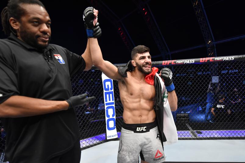 Amir Albazi of Iraq celebrates after his submission victory over Malcolm Gordon of Canada in their bantamweight bout during the UFC Fight Night event inside Flash Forum on UFC Fight Island on July 19, 2020 in Yas Island, Abu Dhabi, United Arab Emirates. (Photo by Jeff Bottari/Zuffa LLC)