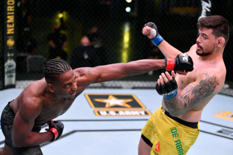 LAS VEGAS, NEVADA - MAY 30: (L-R) Jamahal Hill punches Klidson Abreu of Brazil in their light heavyweight fight during the UFC Fight Night event at UFC APEX on May 30, 2020 in Las Vegas, Nevada. (Photo by Jeff Bottari/Zuffa LLC)
