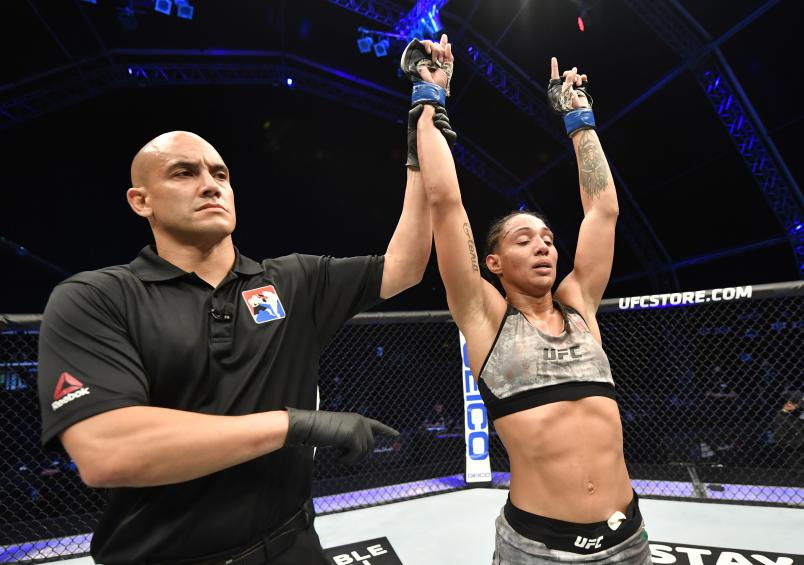 Taila Santos of Brazil celebrates after her decision victory over Molly McCann in their flyweight fight during the UFC Fight Night event inside Flash Forum on UFC Fight Island on July 16, 2020 in Yas Island, Abu Dhabi, United Arab Emirates. (Photo by Jeff Bottari/Zuffa Getty Images)