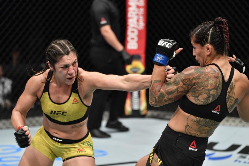 Bethe Correia of Brazil punches Pannie Kianzad of Iran in their bantamweight fight during the UFC Fight Night event inside Flash Forum on UFC Fight Island on July 26, 2020 in Yas Island, Abu Dhabi, United Arab Emirates. (Photo by Jeff Bottari/Zuffa LLC)