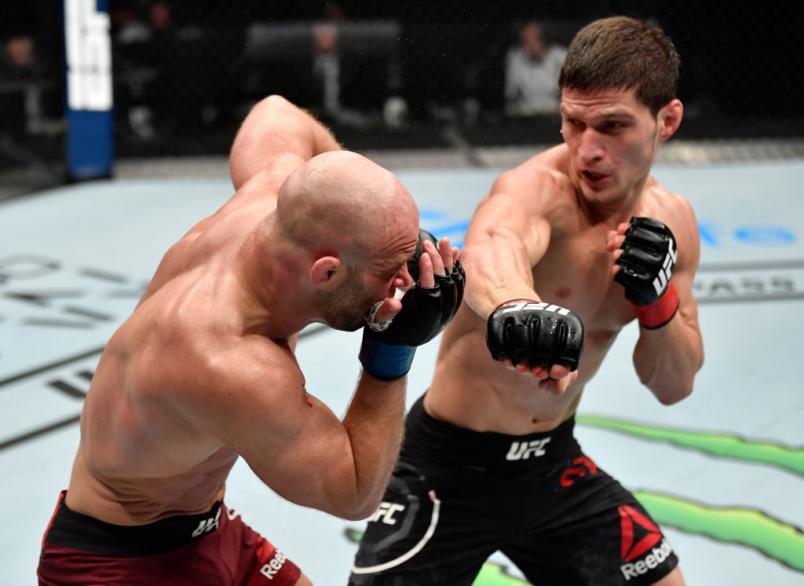 ABU DHABI, UNITED ARAB EMIRATES - JULY 26: (R-L) Movsar Evloev of Russia Mike Grundy in their featherweight fight event inside Flash Forum on UFC Fight Island on July 26, 2020 in Abu Dhabi, United Arab Emirates. (Photo by Jeff Bottari/Zuffa LLC)
