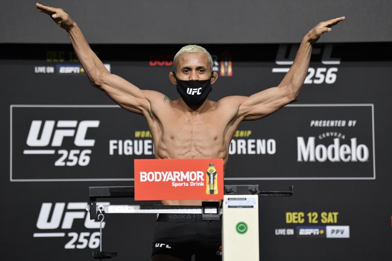 Deiveson Figueiredo of Brazil poses on the scale during the UFC 256 weigh-in at UFC APEX on December 11, 2020 in Las Vegas, Nevada. (Photo by Jeff Bottari/Zuffa LLC via Getty Images)