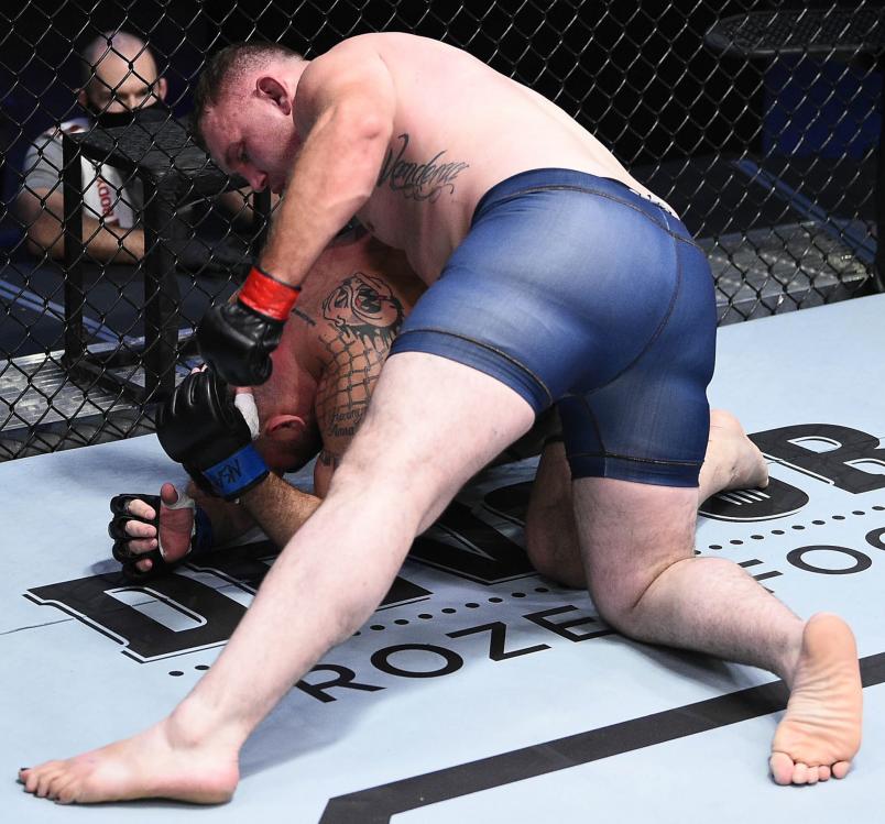 Jared Vanderaa punches Harry Hunsucker in a heavyweight fight during Dana White's Contender Series season four, week eight at UFC APEX on November 04, 2020 in Las Vegas, Nevada. (Photo by Chris Unger/DWCS LLC/Zuffa LLC)