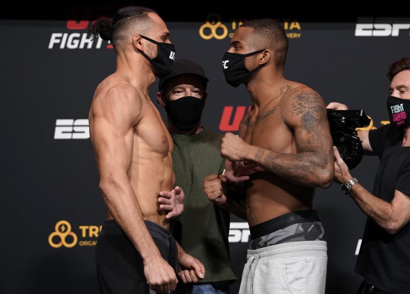 Michel Pereira of Brazil and Khaos Williams face off during the UFC Fight Night weigh-in at UFC APEX on December 18, 2020 in Las Vegas, Nevada. (Photo by Cooper Neill/Zuffa LLC)