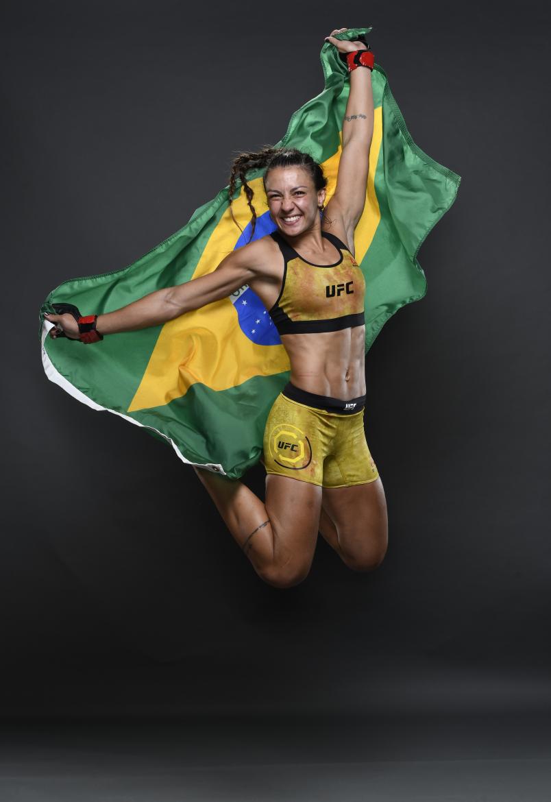 Amanda Ribas of Brazil poses for a portrait backstage with her team after her victory during the UFC Fight Night event on March 14, 2020 in Brasilia, Brazil. (Photo by Mike Roach/Zuffa LLC via Getty Images)