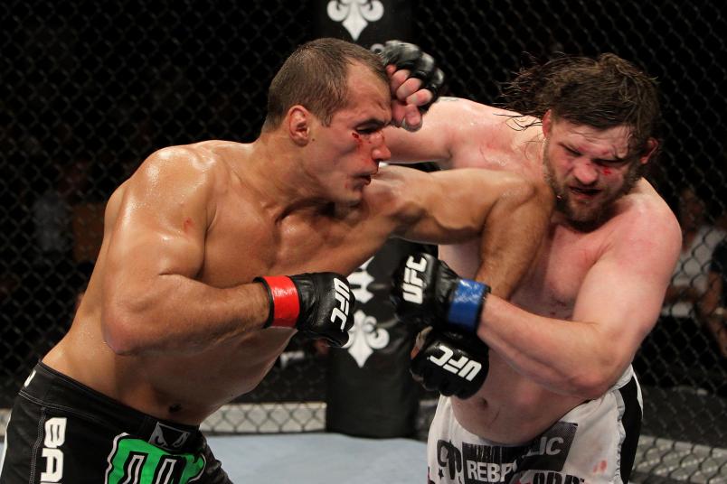 Junior dos Santos elbows Roy Nelson during their UFC Heavyweight bout at Oracle Arena on August 7, 2010 in Oakland, California. (Photo by Josh Hedges/Zuffa LLC)