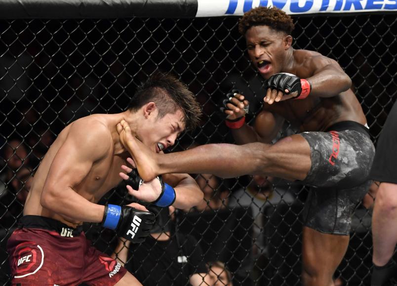 Hakeem Dawodu of Canada kicks Yoshinori Horie in their featherweight bout during the UFC 240 event at Rogers Place on July 27, 2019 in Edmonton, Alberta, Canada. (Photo by Jeff Bottari/Zuffa LLC)