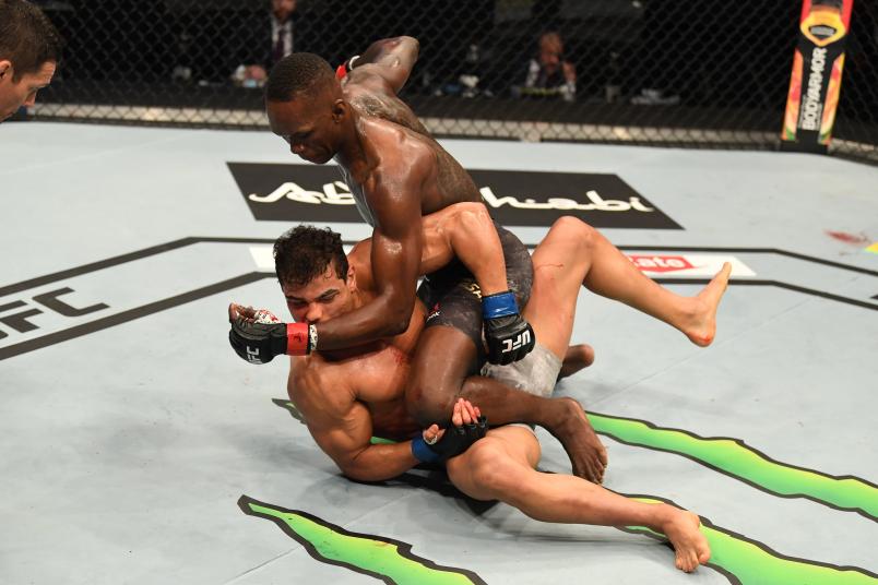 Israel Adesanya punches Paulo Costa in their middleweight championship bout during UFC 253 inside Flash Forum on UFC Fight Island on September 27, 2020 in Abu Dhabi, United Arab Emirates. (Photo by Josh Hedges/Zuffa LLC)