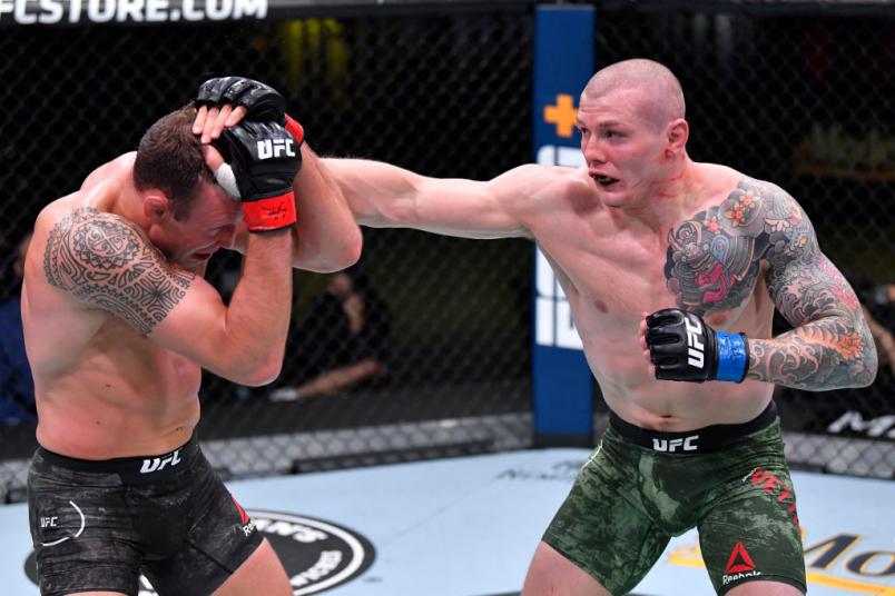 DECEMBER 05: (R-L) Marvin Vettori of Italy punches Jack Hermansson of Sweden in a middleweight bout during the UFC Fight Night event at UFC APEX on December 05, 2020 in Las Vegas, Nevada. (Photo by Chris Unger/Zuffa LLC)