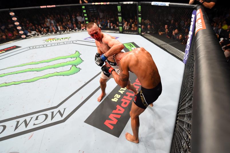 Rory MacDonald punches Robbie Lawler in their UFC welterweight title fight during the UFC 189 event inside MGM Grand Garden Arena on July 11, 2015 in Las Vegas, Nevada. (Photo by Josh Hedges/Zuffa LLC)