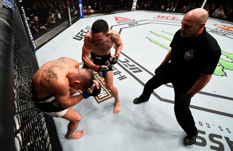 Max Holloway punches Anthony Pettis in their interim UFC featherweight championship bout during the UFC 206 event inside the Air Canada Centre on December 10, 2016 in Toronto, Ontario, Canada. (Photo by Jeff Bottari/Zuffa LLC)