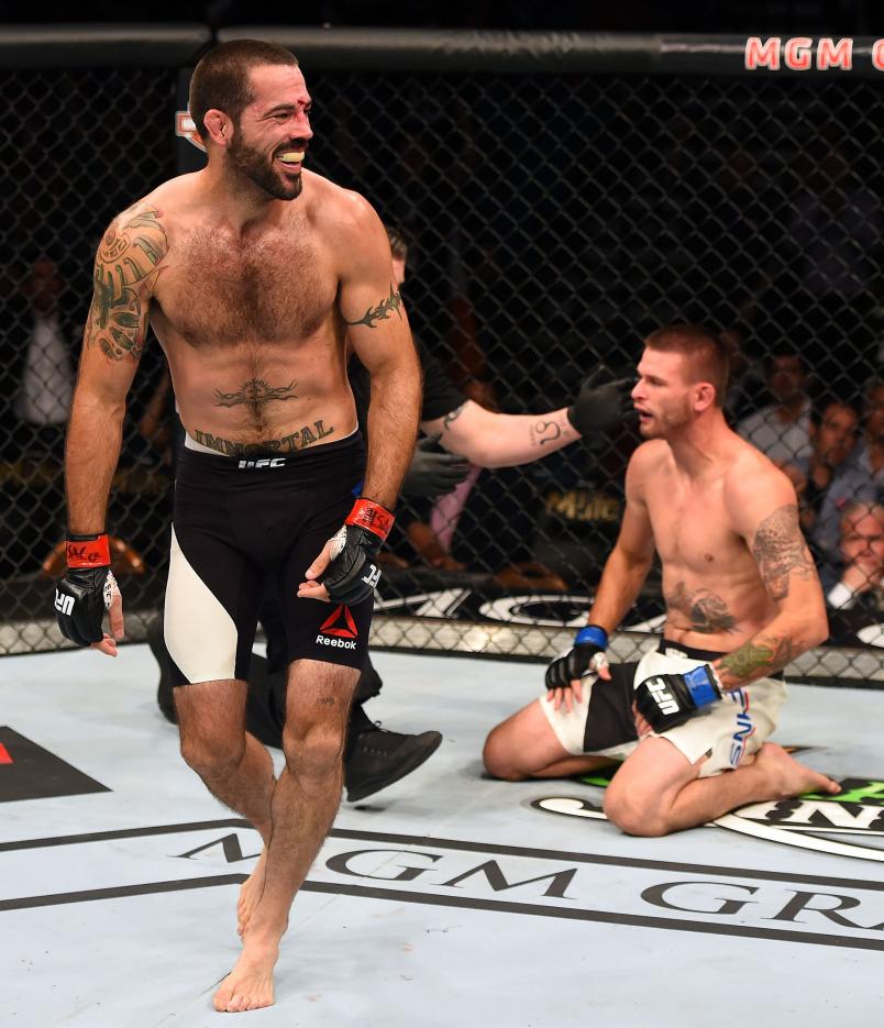 Matt Brown (left) reacts to his victory over Tim Means in their welterweight fight during the UFC 189 event inside MGM Grand Garden Arena on July 11, 2015 in Las Vegas, Nevada. (Photo by Josh Hedges/Zuffa LLC)
