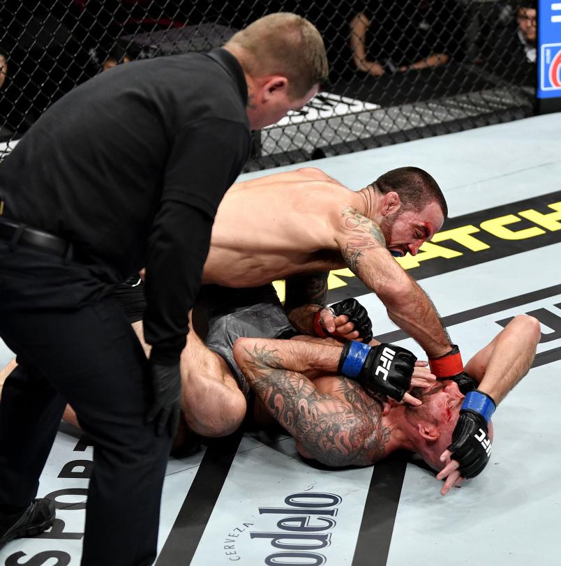 Matt Brown finishes Ben Saunders in their welterweight bout during the UFC 245 event at T-Mobile Arena on December 14, 2019 in Las Vegas, Nevada. (Photo by Jeff Bottari/Zuffa LLC)