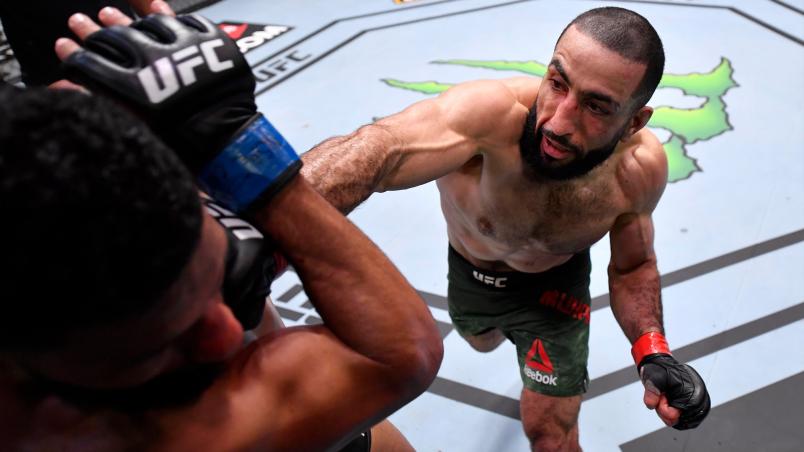Belal Muhammad punches Dhiego Lima of Brazil in their welterweight fight during the UFC 258 event at UFC APEX on February 13, 2021 in Las Vegas, Nevada. (Photo by Jeff Bottari/Zuffa LLC)