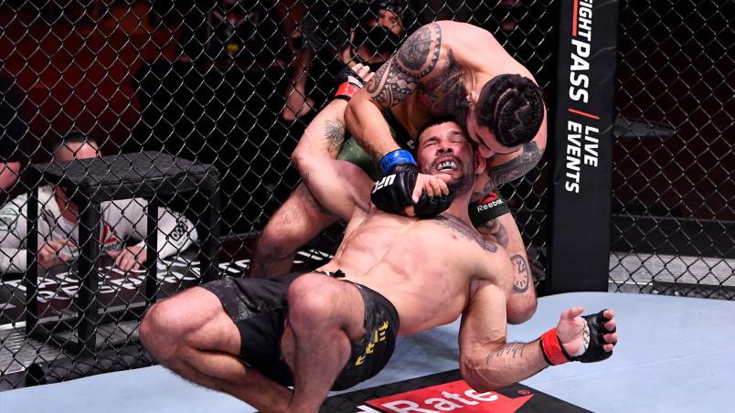 Anthony Hernandez attempts to secure a choke submission against Rodolfo Vieira of Brazil in their middleweight fight during the UFC 258 event at UFC APEX on February 13, 2021 in Las Vegas, Nevada. (Photo by Jeff Bottari/Zuffa LLC)