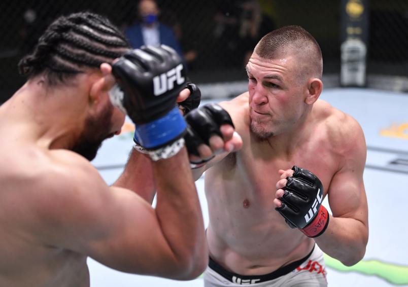 Dustin Jacoby punches Justin Ledet in a light heavyweight bout during the UFC Fight Night event at UFC APEX on October 31, 2020 in Las Vegas, Nevada. (Photo by Jeff Bottari/Zuffa LLC)