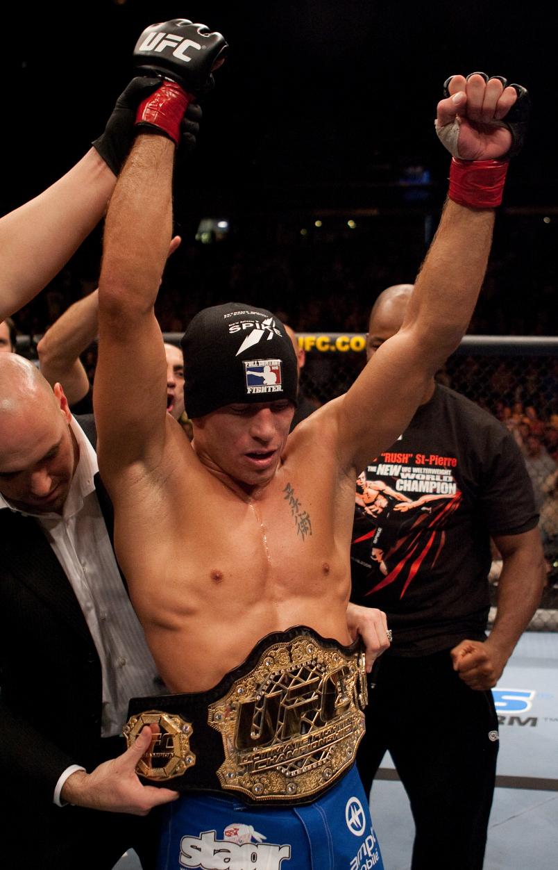 Georges St-Pierre celebrates his victory over Matt Hughes to win the UFC Welterweight Championship at UFC 65 at the Arco Arena on November 18, 2006 in Sacramento, California. (Photo by Josh Hedges/Zuffa LLC)