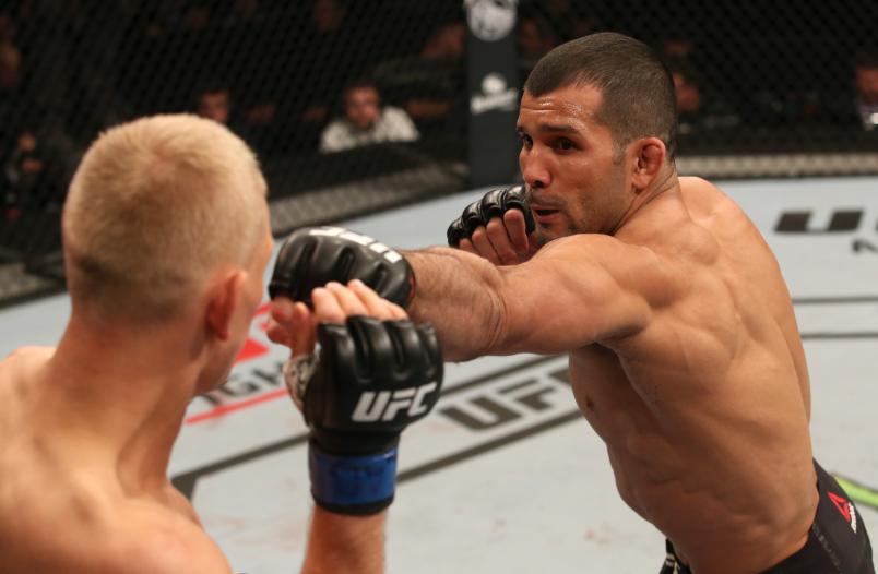 Rodolfo Vieira of Brazil punches Oskar Piechota of Poland in their middleweight fight during the UFC Fight Night event at Antel Arena on August 10, 2019 in Montevideo, Uruguay. (Photo by Alexandre Schneider /Zuffa LLC)