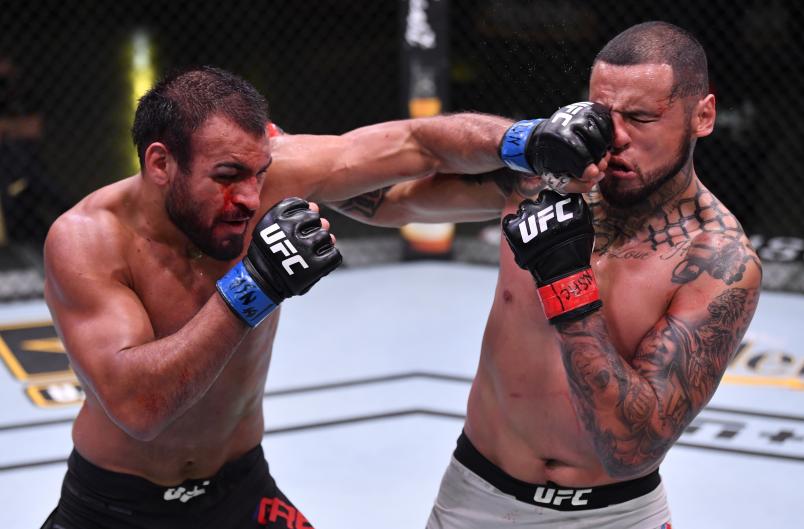 Gabe Green punches Daniel Rodriguez in their welterweight fight during the UFC Fight Night event at UFC APEX on May 30, 2020 in Las Vegas, Nevada. (Photo by Jeff Bottari/Zuffa LLC)