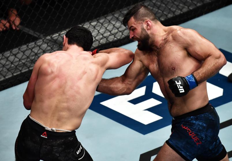 Julian Marquez punches Alessio Di Chirico of Itlay during The Ultimate Fighter Finale event inside The Pearl concert theater at Palms Casino Resort on July 6, 2018 in Las Vegas, Nevada. (Photo by Brandon Magnus/Zuffa LLC)