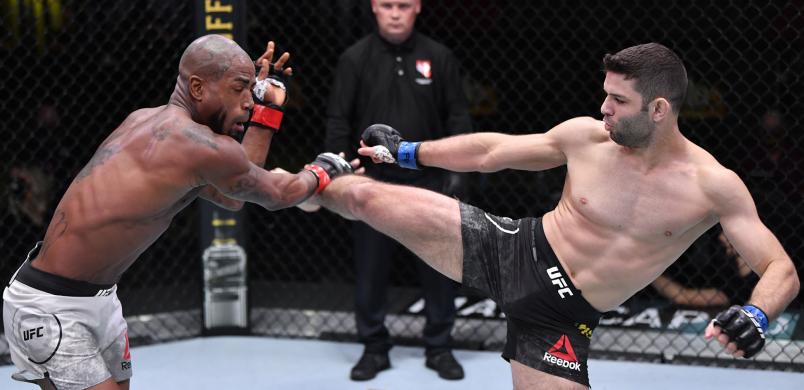 Thiago Moises of Brazil kicks Bobby Green in a lightweight bout during the UFC Fight Night event at UFC APEX on October 31, 2020 in Las Vegas, Nevada. (Photo by Jeff Bottari/Zuffa LLC)