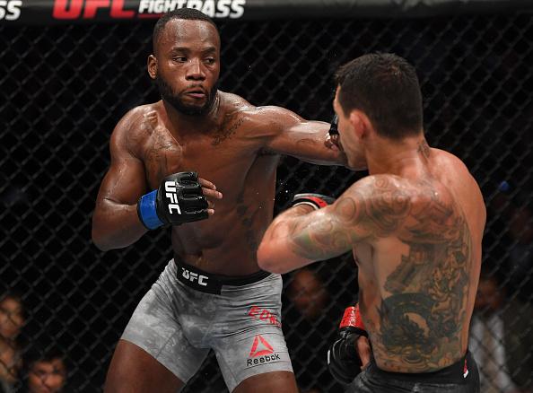 Leon Edwards of Jamaica punches Rafael Dos Anjos of Brazil in their welterweight bout during the UFC Fight Night event at AT&T Center on July 20, 2019 in San Antonio, Texas. (Photo by Josh Hedges/Zuffa LLC)