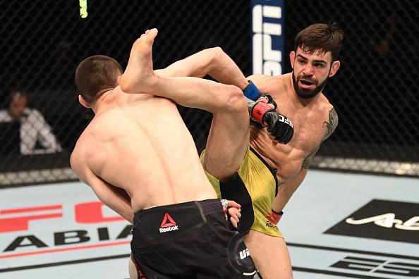 Bruno Silva of Brazil kicks Tagir Ulanbekov of Russia in their flyweight bout during the UFC Fight Night event inside Flash Forum on UFC Fight Island on October 11, 2020 in Yas Island, Abu Dhabi, United Arab Emirates. (Photo by Josh Hedges/Zuffa LLC)